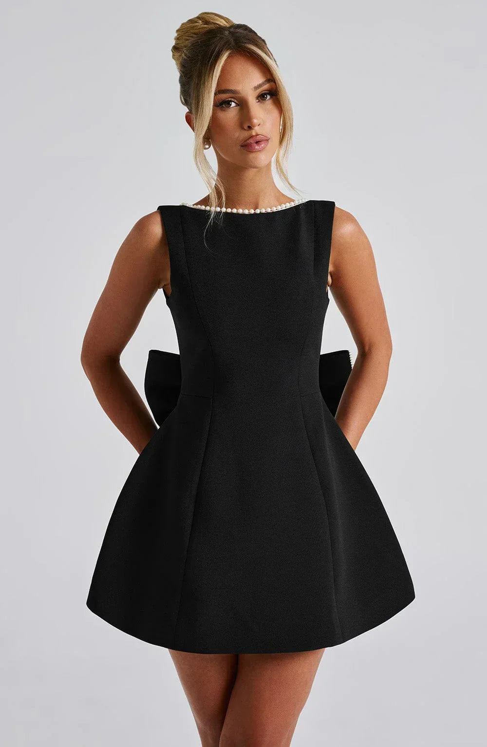 Women's Short Dress with Oversized Bow at the Back