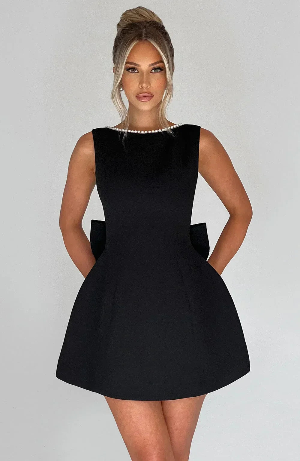 Women's Short Dress with Oversized Bow at the Back